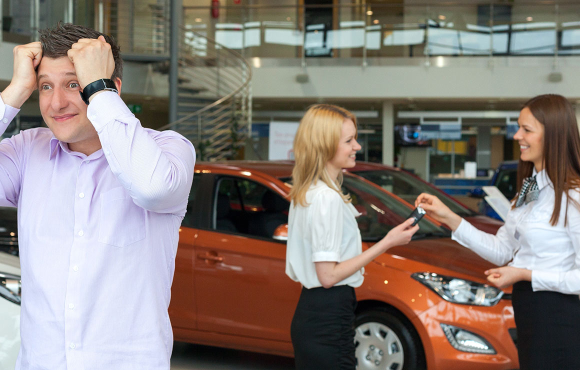 couple buying a car