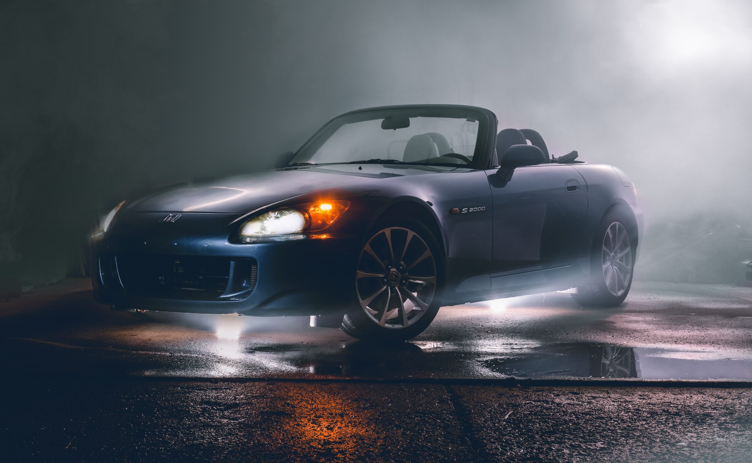 gray car on a wet road
