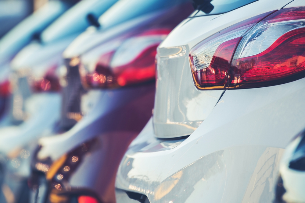 cars lined up at a dealership