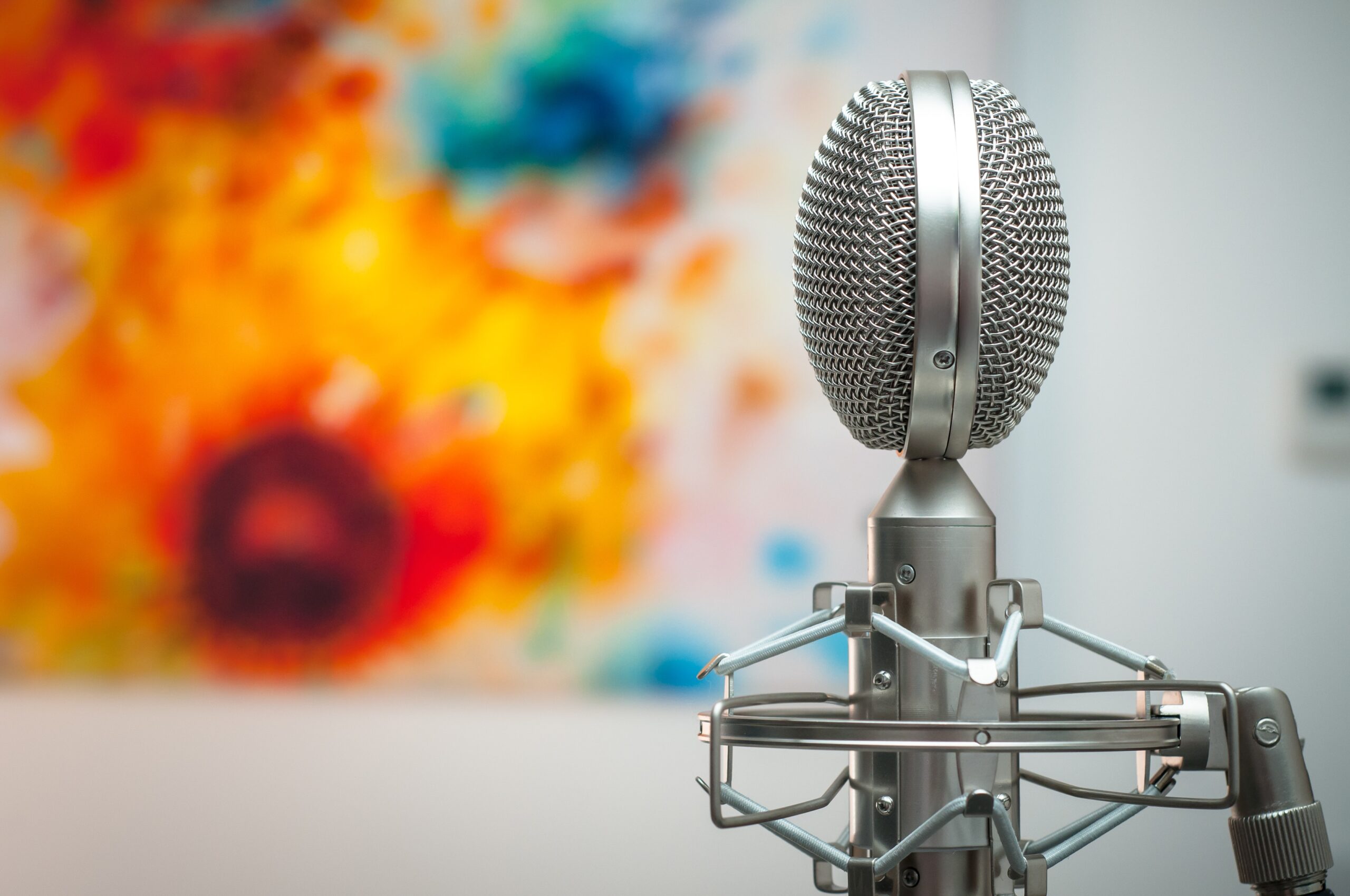 picture of microphone in front of a painting