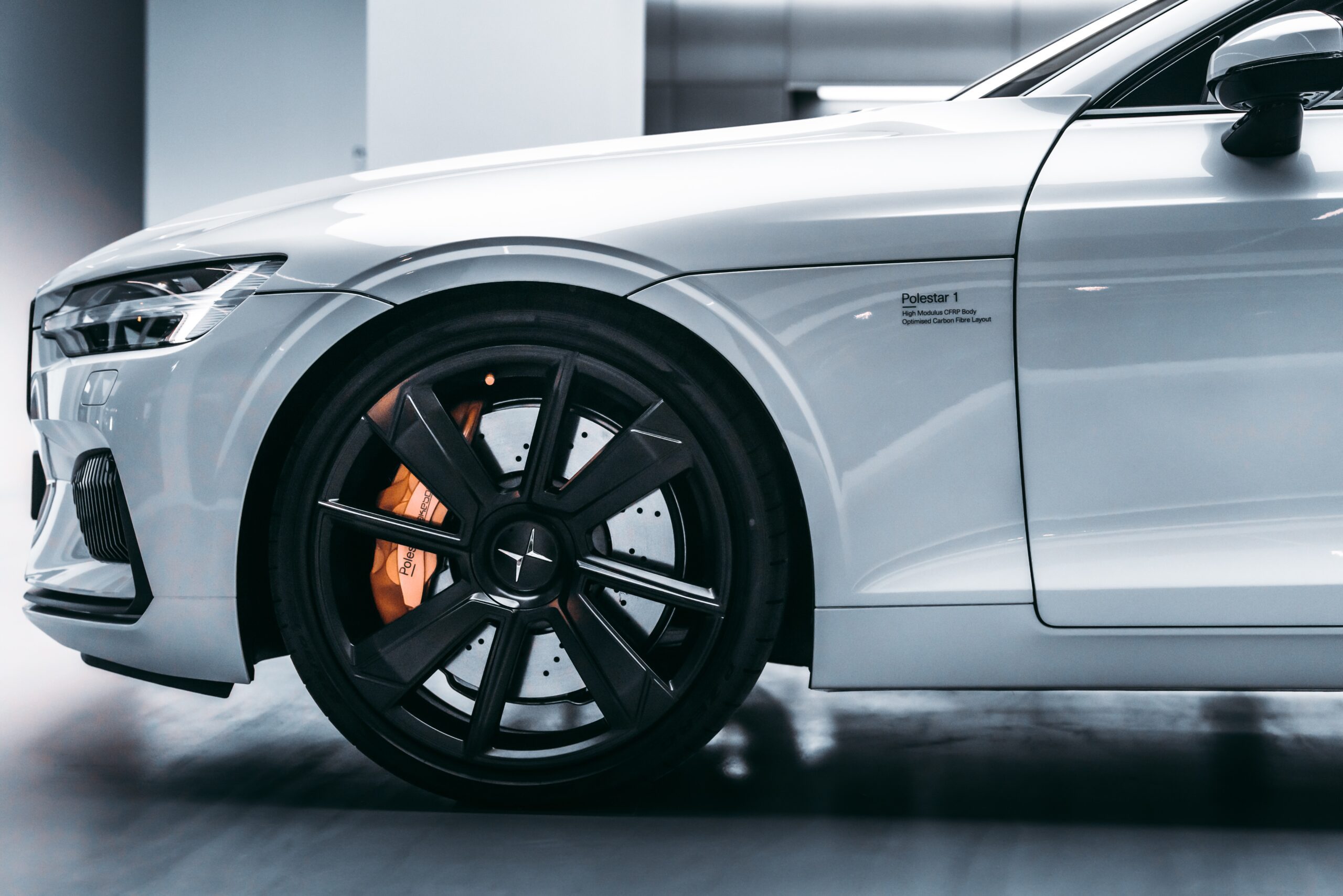 beautiful car in a white room