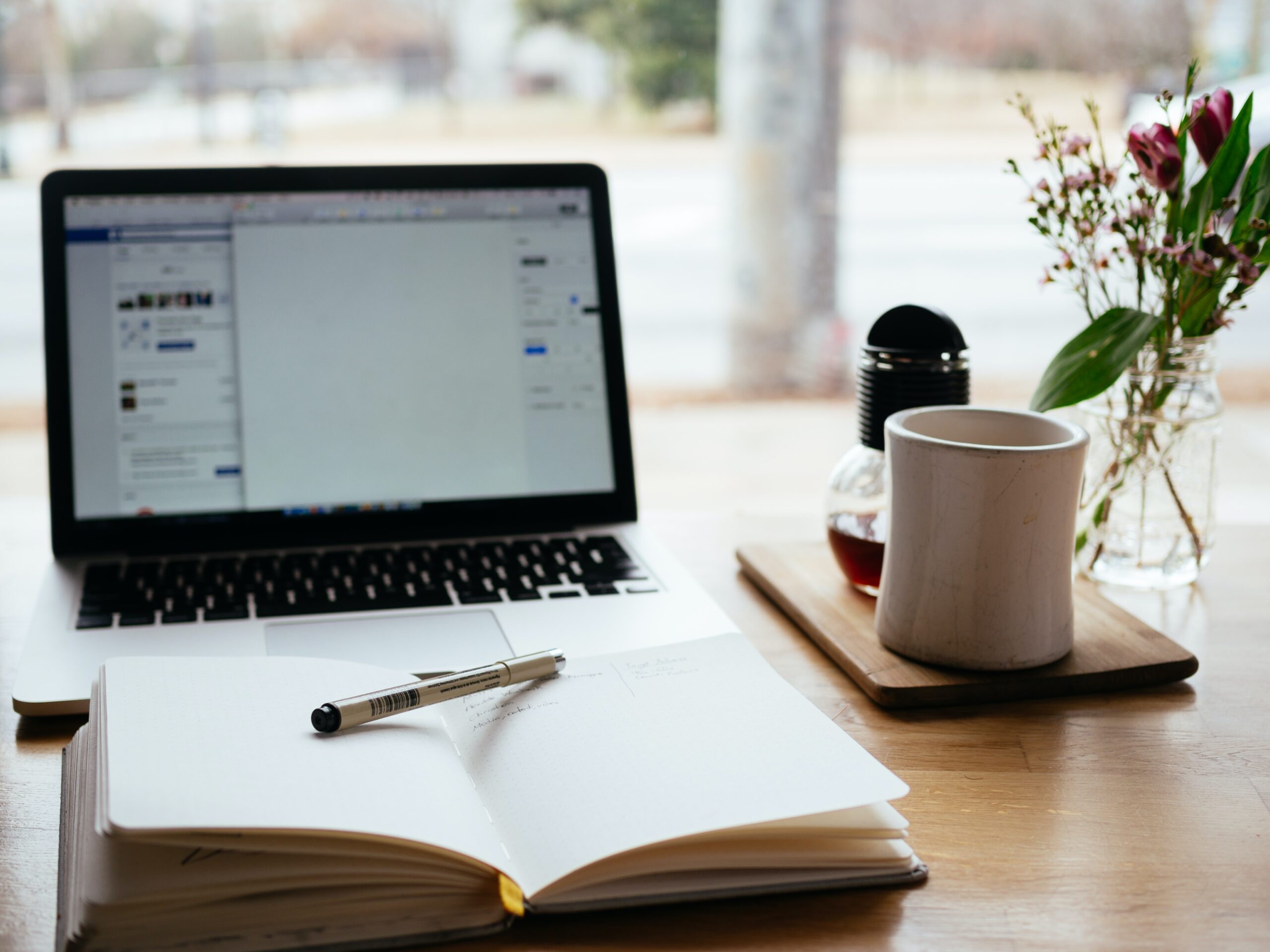 coffee and a computer on a desk